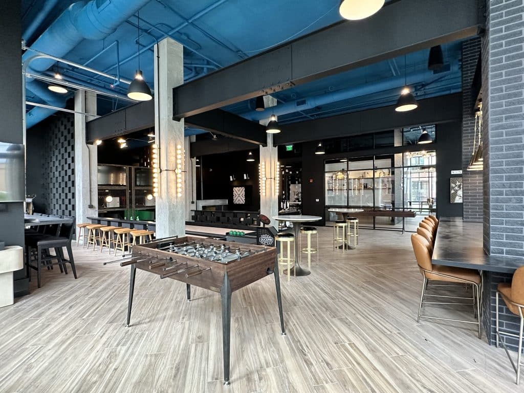 Margaux Midtown community clubroom with foosball and ample seating