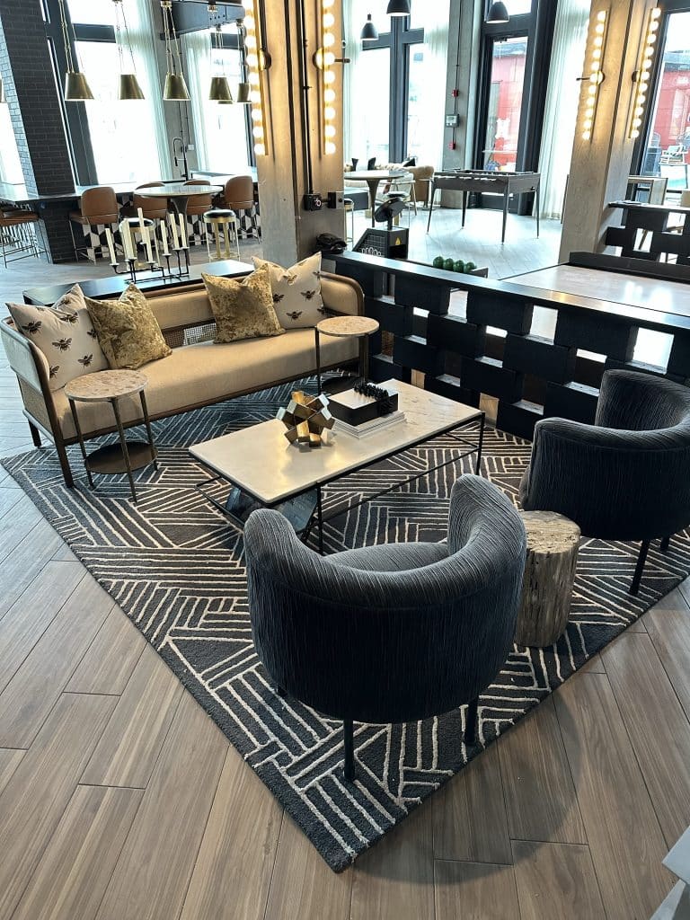 Modern clubroom seating area available to residents at Margaux Midtown