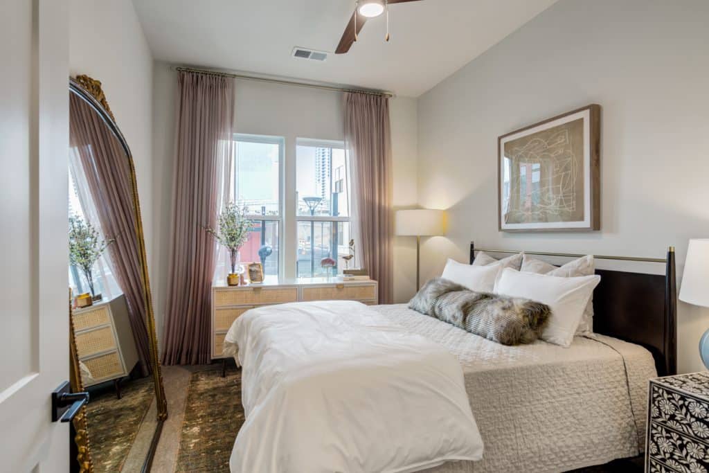 Furnished bedroom with modern furniture at Margaux Midtown