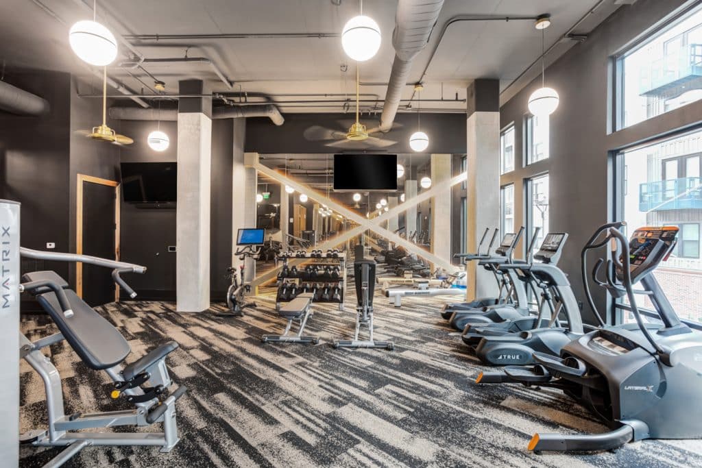 Ample natural lighting from the large windowsin fitness center at Margaux Midtown
