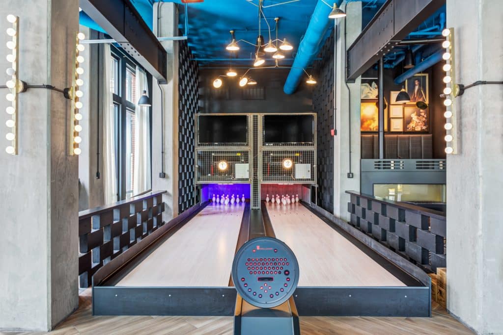 Bowling lanes in Margaux Midtown's community room
